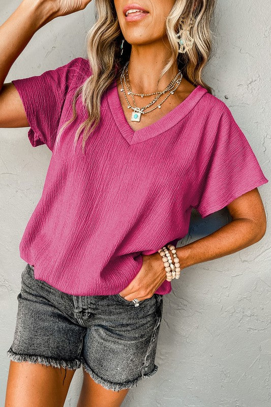 Bright Pink Crinkled V Neck Wide Sleeve T-shirt by YNIQUE | Fleurcouture