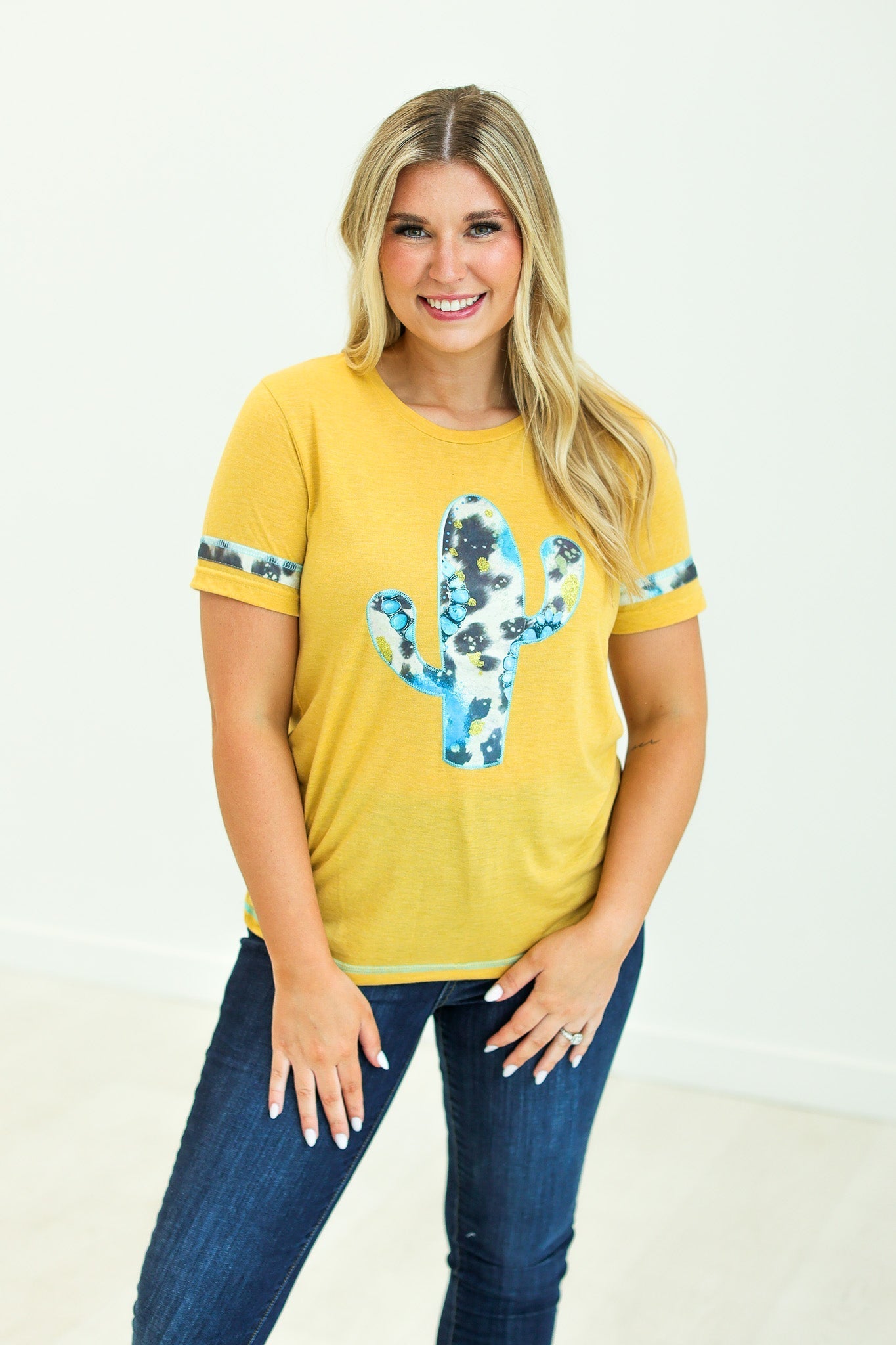 Cactus and Turquoise on Mustard Tee with Cowprint Yellow Wanderer Rotation by Southern Grace | Fleurcouture