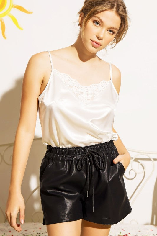 LEATHER SHORTS WITH POCKETS ELASTIC AND DRAWSTRING by Sweet Generis | Fleurcouture