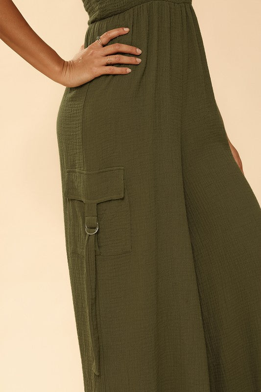 Smocked wide leg cargo jumpsuit Olive by Miss Sparkling | Fleurcouture
