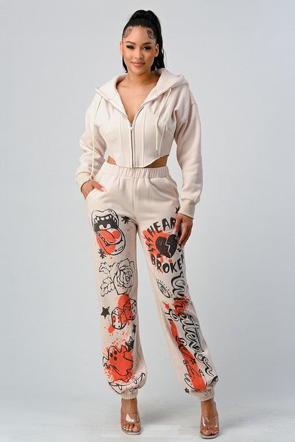 ATHINA CASUAL JACKET AND GRAPHIC PANTS SET IVORY by Athina | Fleurcouture