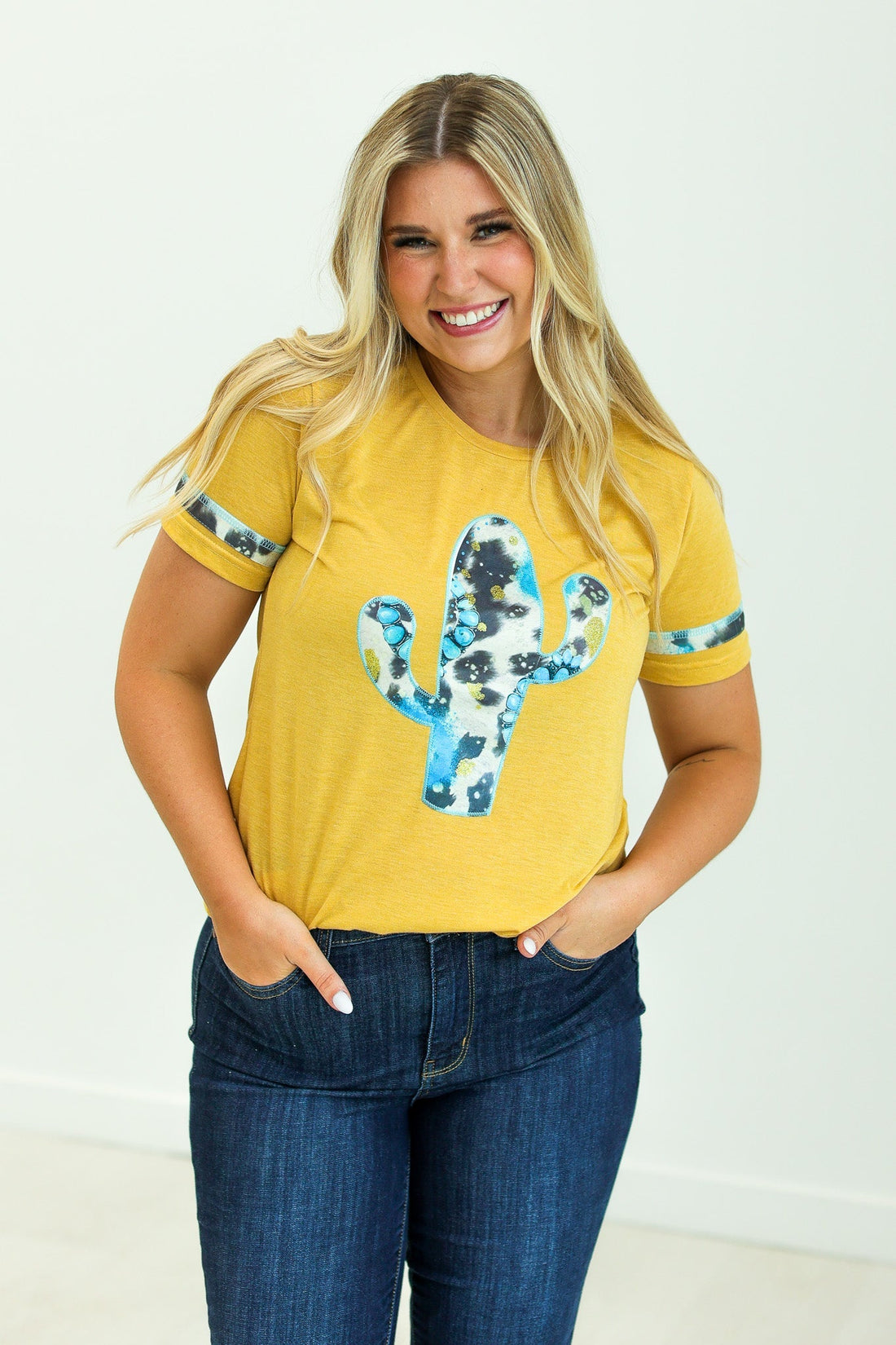 Cactus and Turquoise on Mustard Tee with Cowprint Yellow Wanderer Rotation by Southern Grace | Fleurcouture