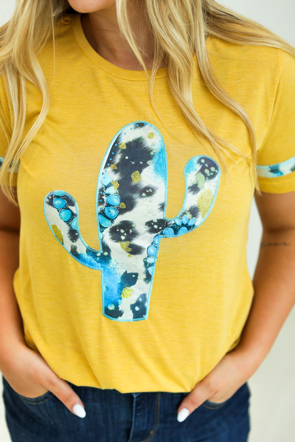 Cactus and Turquoise on Mustard Tee with Cowprint Yellow Wanderer Rotation by Southern Grace | Fleurcouture