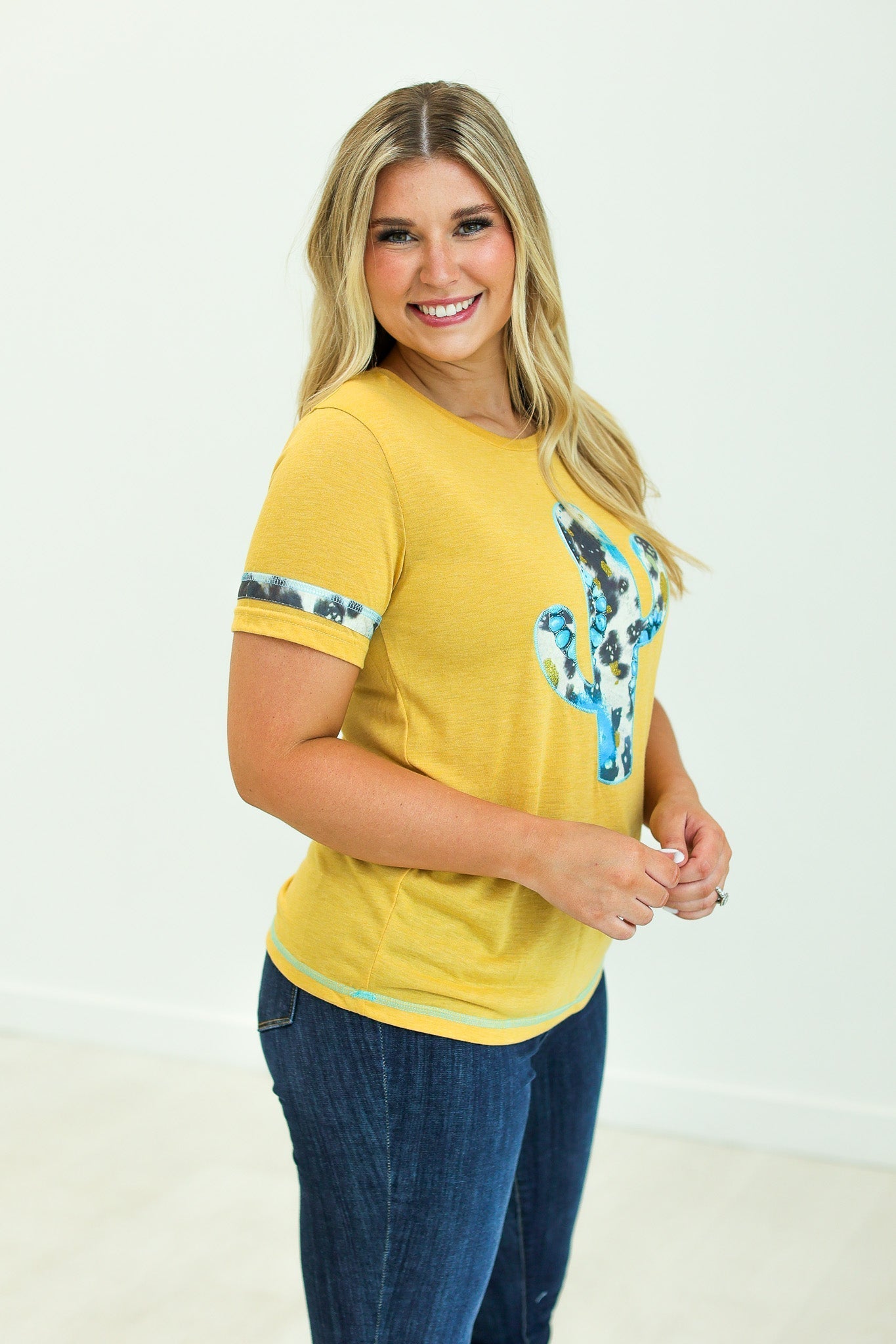 Cactus and Turquoise on Mustard Tee with Cowprint Yellow Wanderer Rotation by Southern Grace | Fleurcouture