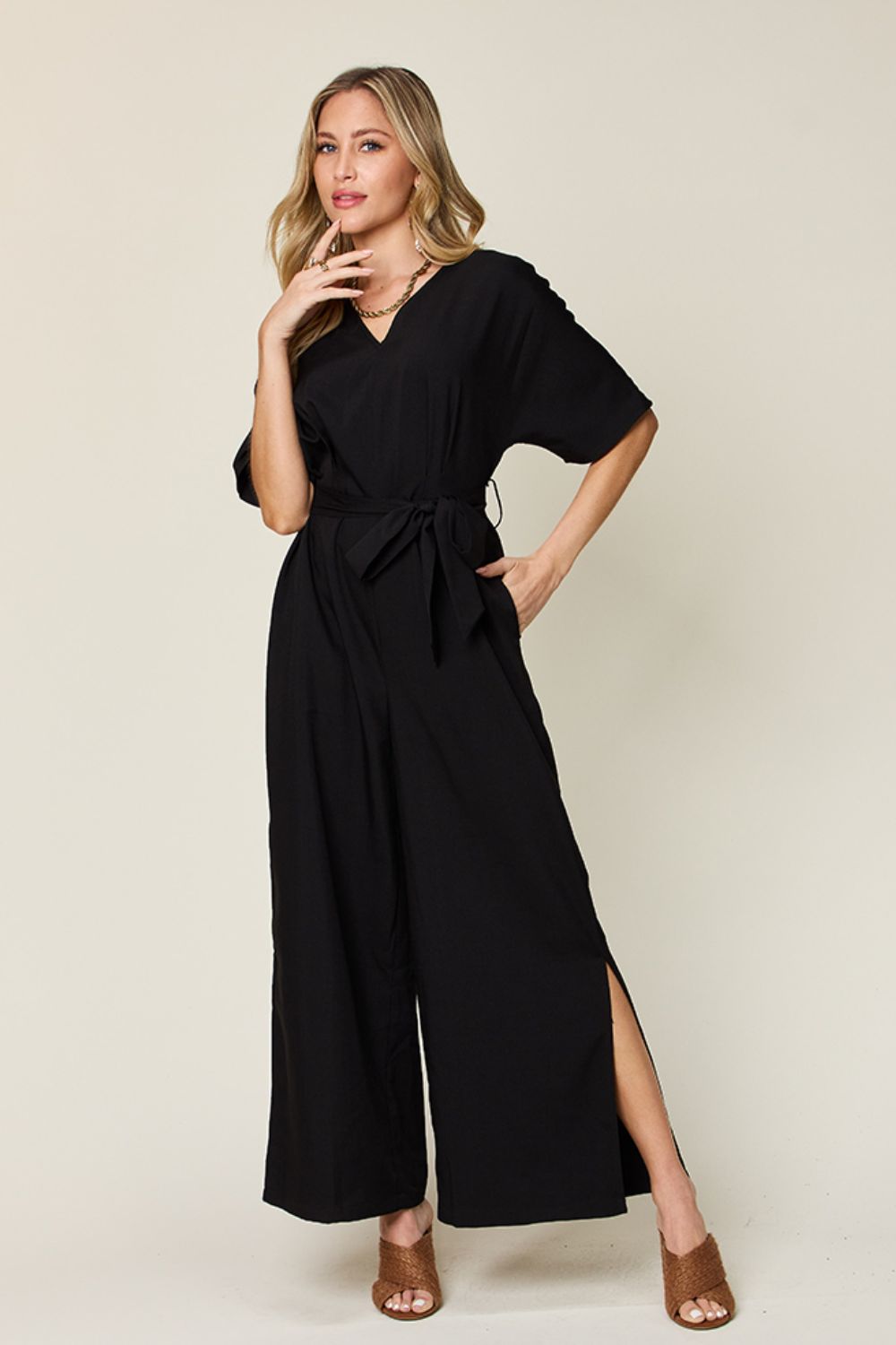 Double Take Full Size V-Neck Tie Front Short Sleeve Slit Jumpsuit Black Jumpsuits by Trendsi | Fleurcouture