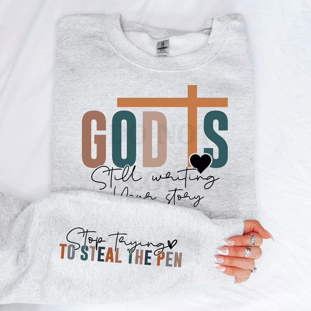 God Is Still Writing Your Story With Sleeve Accent Sweatshirt by Gabreila Wholesale | Fleurcouture