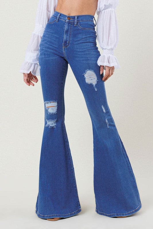 High-Rise Distressed Flare Jeans Medium Stone Flare Jeans by Vibrant M.i.U | Fleurcouture