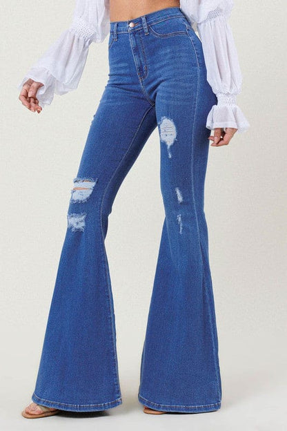 High-Rise Distressed Flare Jeans Medium Stone Flare Jeans by Vibrant M.i.U | Fleurcouture