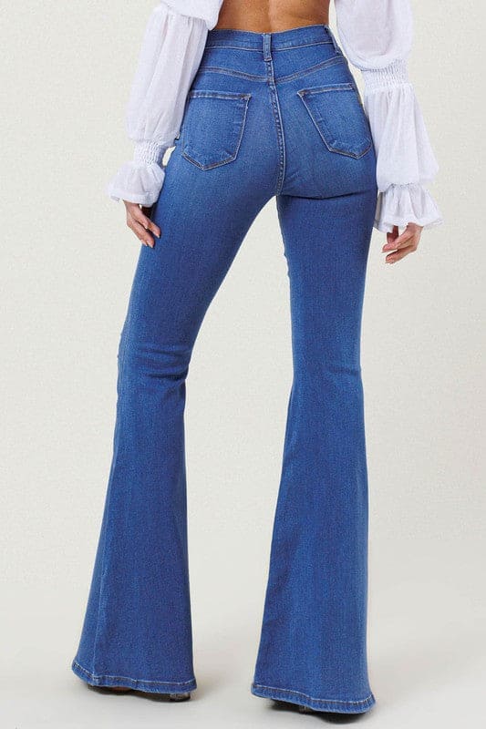 High-Rise Distressed Flare Jeans Medium Stone Flare Jeans by Vibrant M.i.U | Fleurcouture