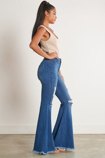 High-Waisted Distressed Flare Jeans Medium Stone Flare Jeans by Vibrant M.i.U | Fleurcouture