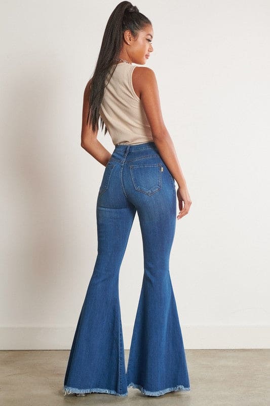 High-Waisted Distressed Flare Jeans Medium Stone Flare Jeans by Vibrant M.i.U | Fleurcouture