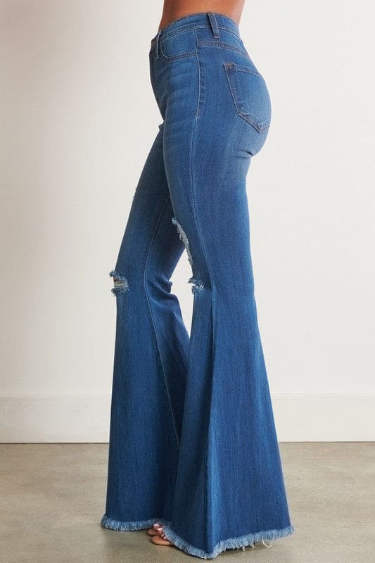 High-Waisted Distressed Flare Jeans Medium Stone Flare Jeans by Vibrant M.i.U | Fleurcouture