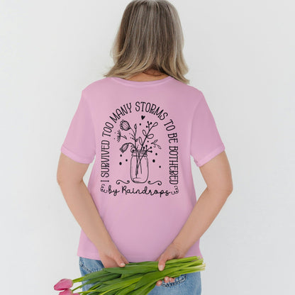 I Have Survived To Many Storms Graphic Tee S Blossom T-shirt by Tea Shirt Shoppe | Fleurcouture