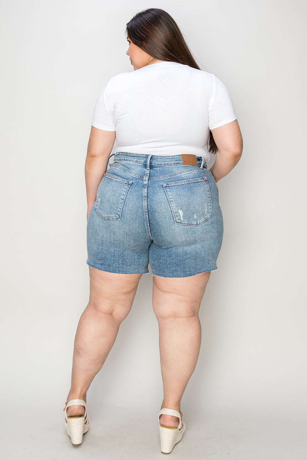 Judy Blue Full Size High Waist Raw Hem Denim Shorts Medium Denim Shorts by Trendsi | Fleurcouture