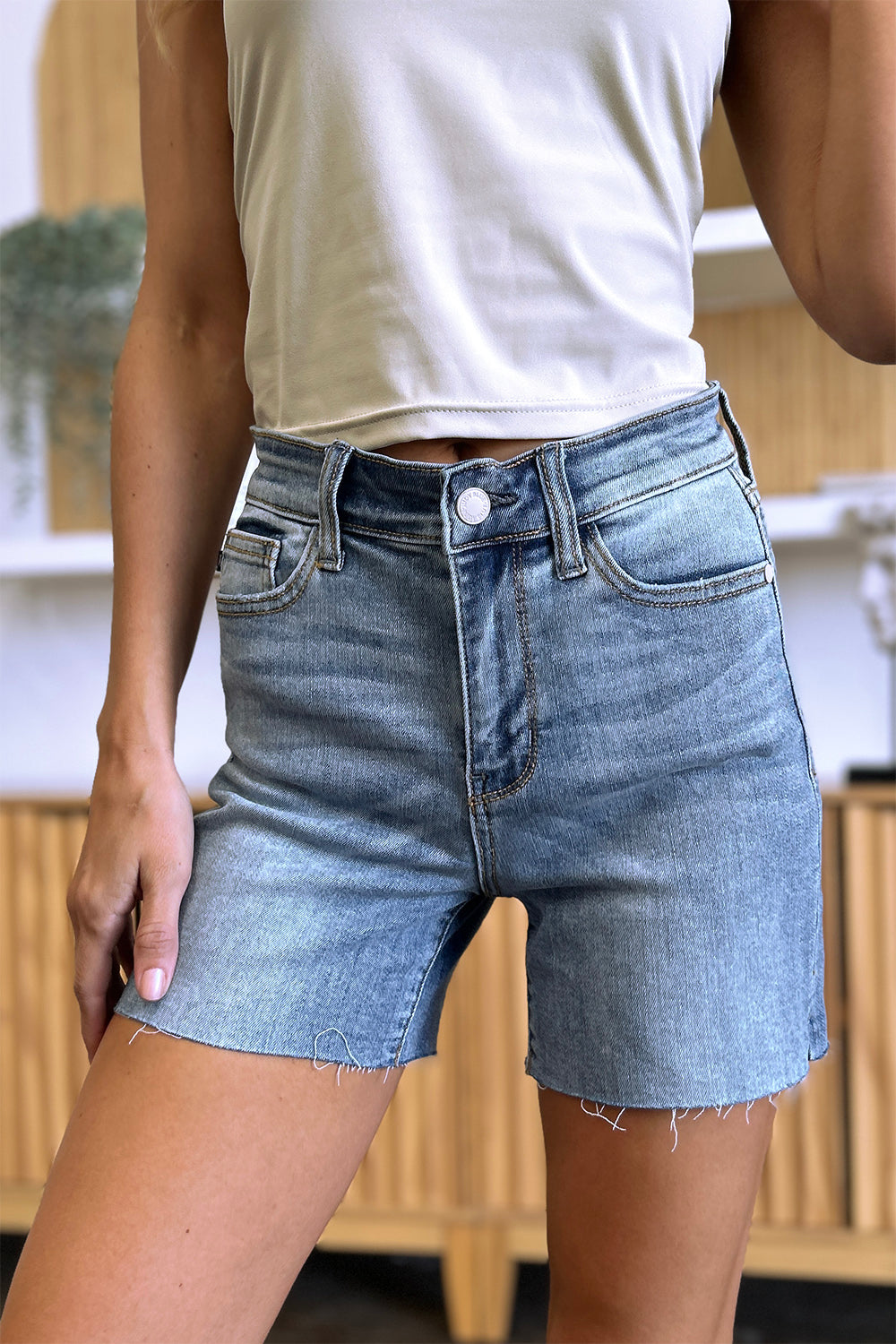 Judy Blue Full Size High Waist Raw Hem Denim Shorts Medium Denim Shorts by Trendsi | Fleurcouture