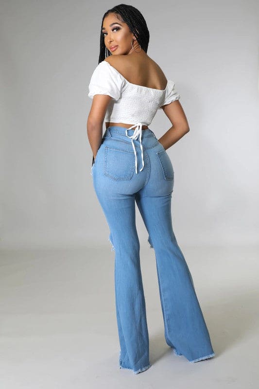 Knee Rip Flare Jean in Medium Wash Medium Wash Flare Jeans by GJG Denim | Fleurcouture