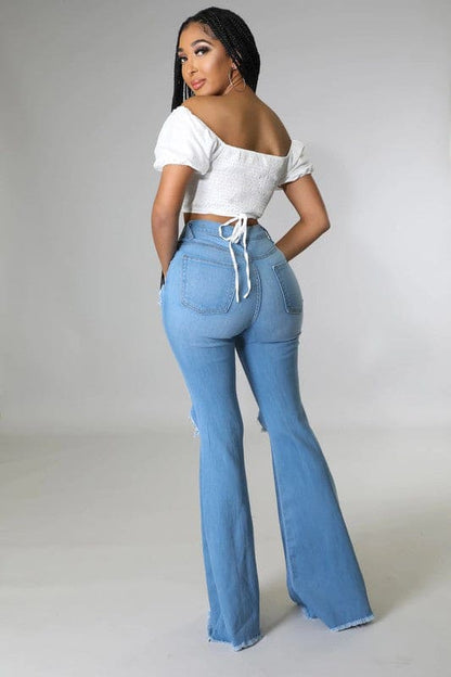 Knee Rip Flare Jean in Medium Wash Medium Wash Flare Jeans by GJG Denim | Fleurcouture