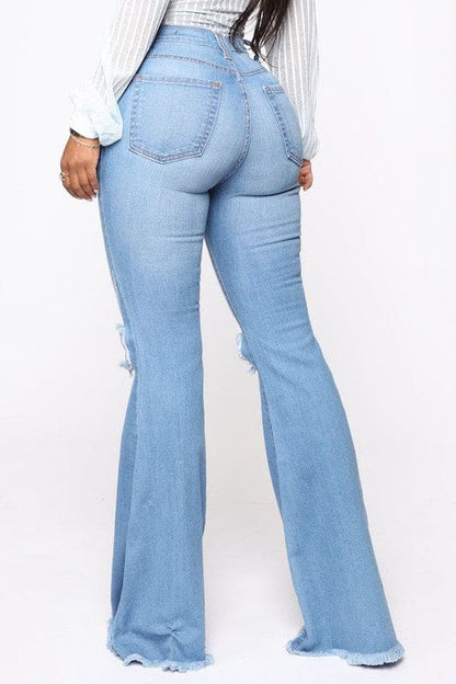 Knee Rip Flare Jean in Medium Wash Medium Wash Flare Jeans by GJG Denim | Fleurcouture