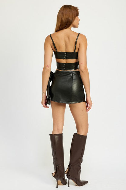 LEATHER MINI SKIRT WITH BOW DETAIL BLACK by Emory Park | Fleurcouture