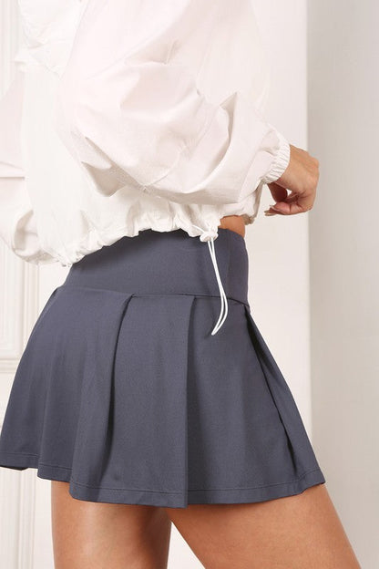 Light fabric tennis skirt by Lilou | Fleurcouture