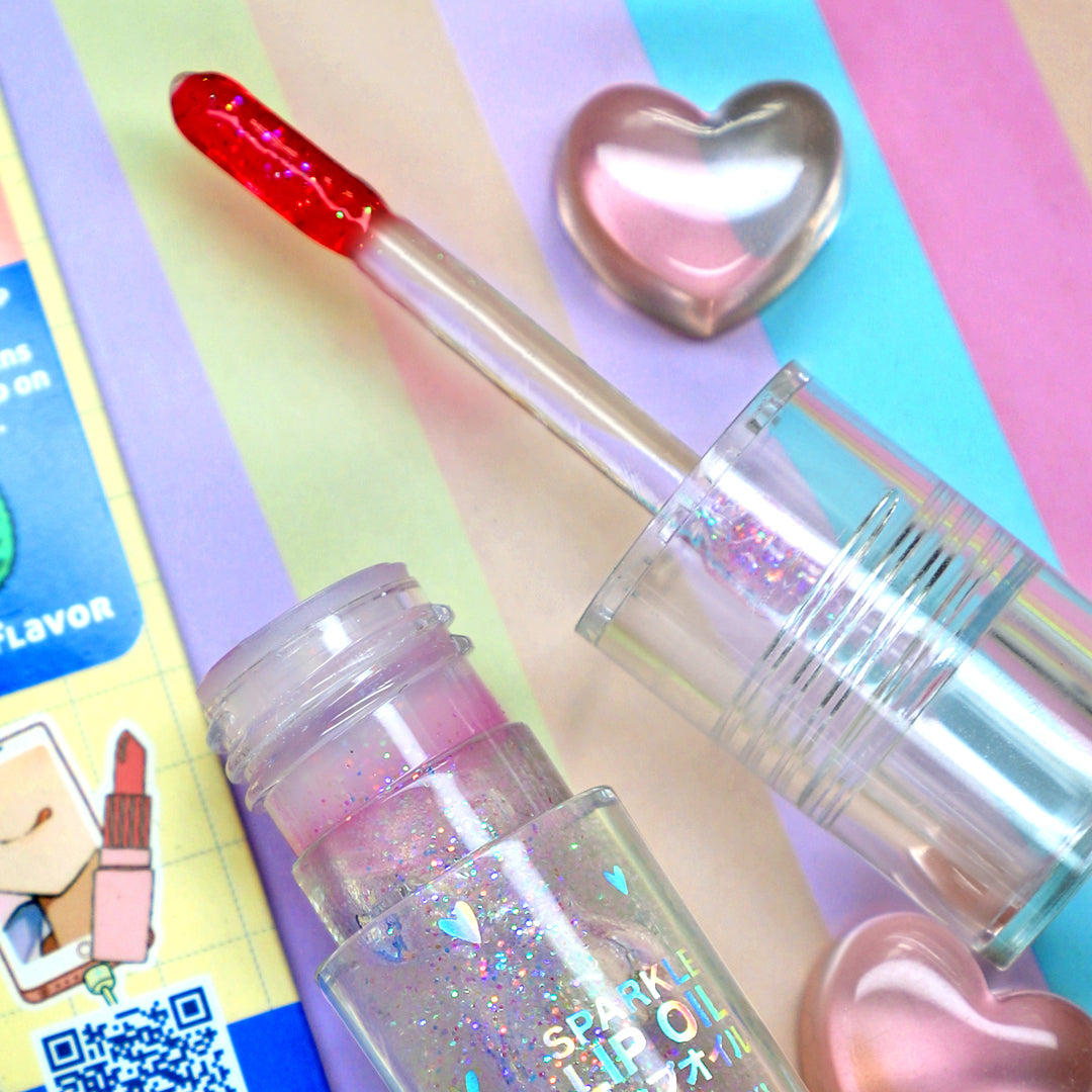 Manga Collection Sparkle Lip Oil Lip Balms &amp; Treatments by Rude Cosmetics | Fleurcouture