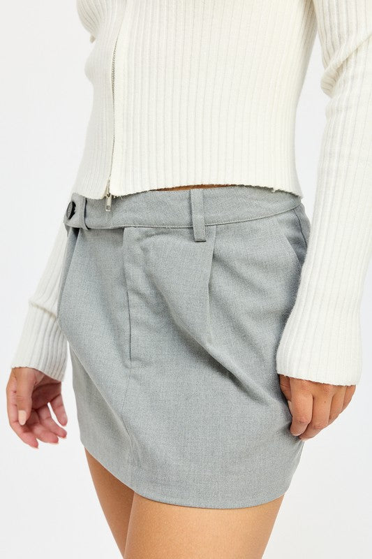 MINI SKIRT WITH DIAGONAL BUTTON DETAIL GREY by Emory Park | Fleurcouture