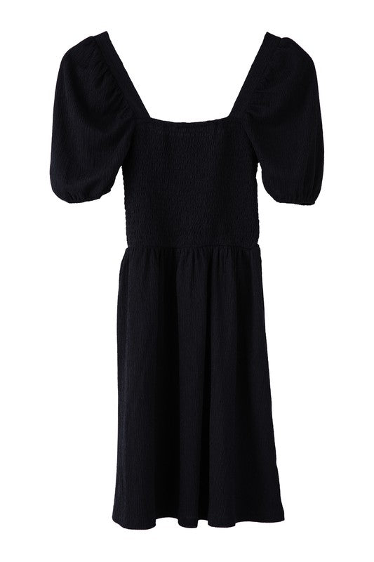 Puff sleeved smocked dress Black by Lilou | Fleurcouture