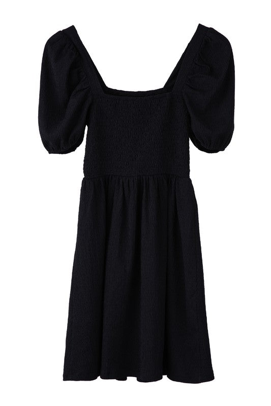 Puff sleeved smocked dress Black by Lilou | Fleurcouture