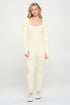 Ribbed Knit Jumpsuit Long Sleeve Beige S by OTOS Active | Fleurcouture