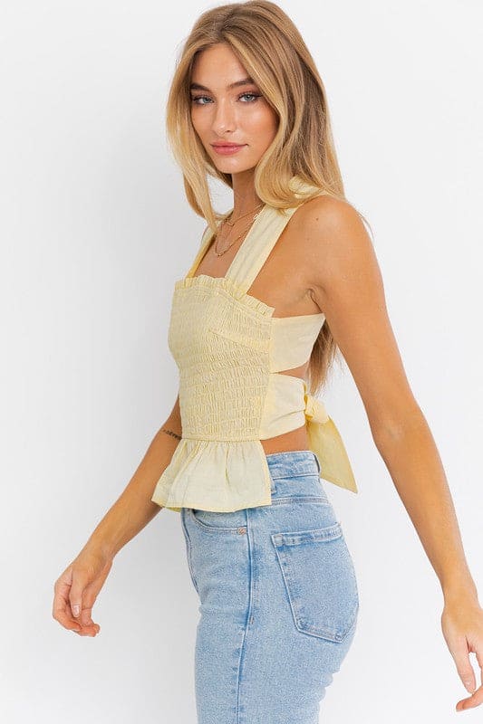 Sleeveless Smocked Peplum Top LEMON by LE LIS | Fleurcouture