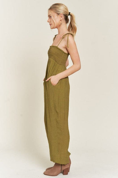 SMOCKED TIE STRAP JUMPSUIT by Jade By Jane | Fleurcouture