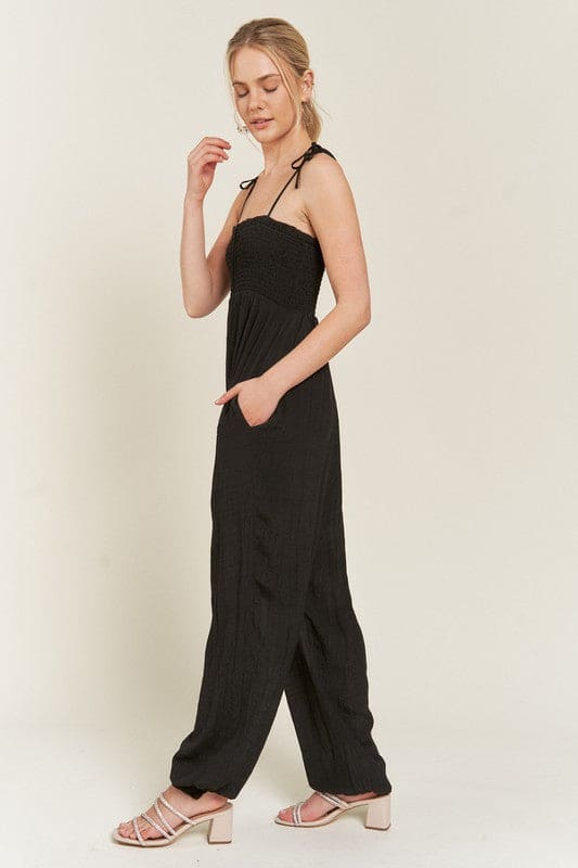 SMOCKED TIE STRAP JUMPSUIT by Jade By Jane | Fleurcouture