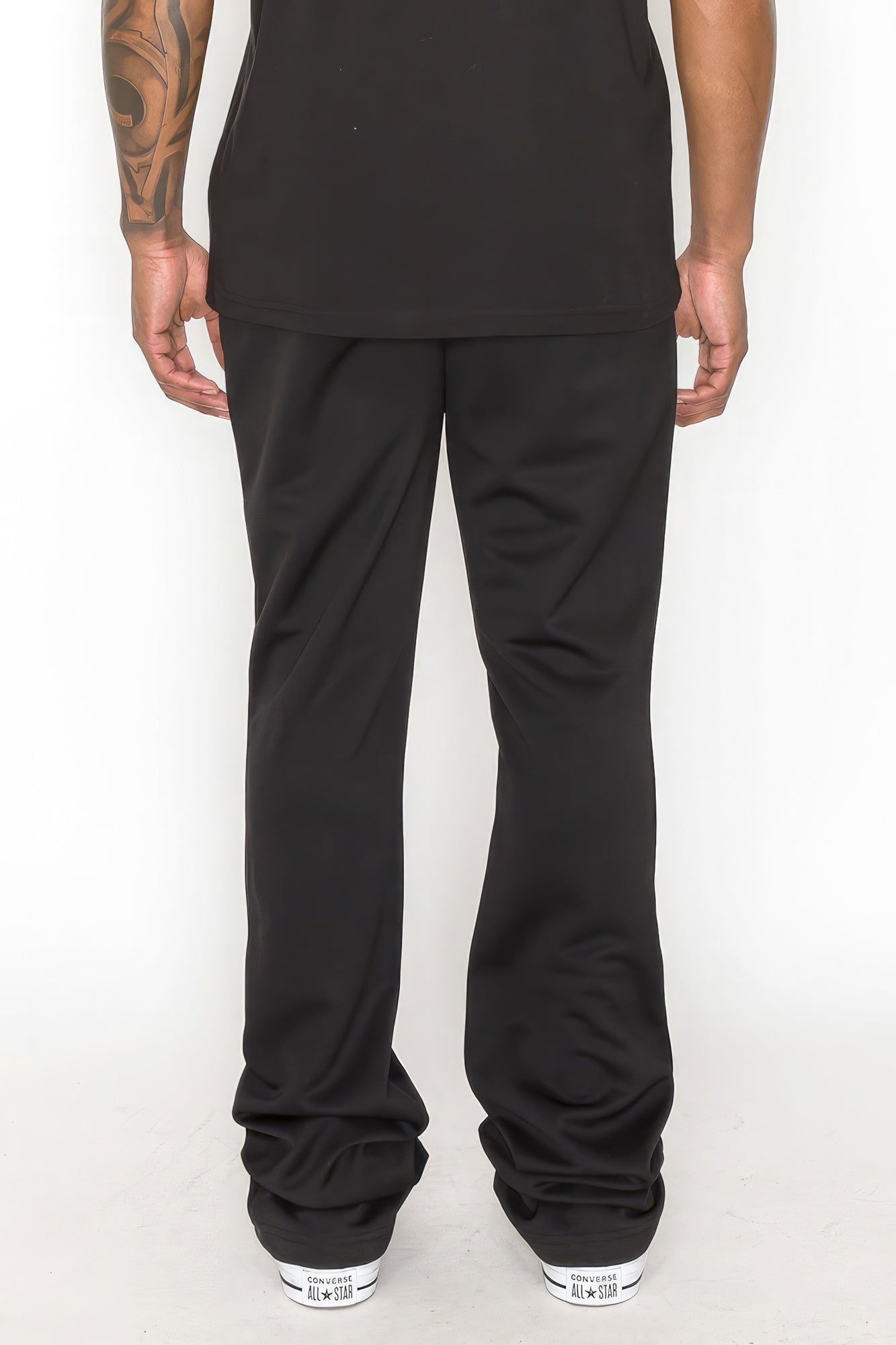 Solid Flare Stacked Track Pants by Fleurcouture | Fleurcouture