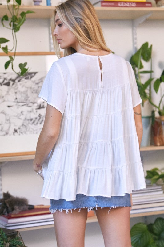 Solid Flared Short Sleeve Top by Davi &amp; Dani | Fleurcouture