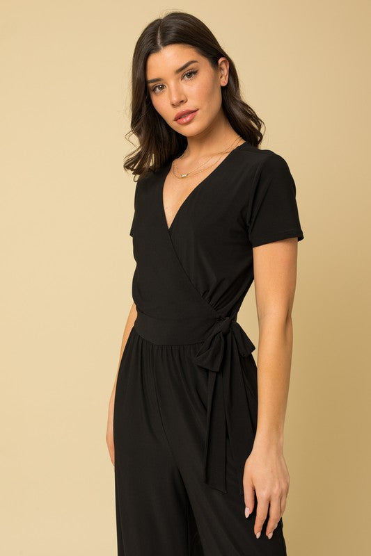 Solid Surplice Cropped Jumpsuit with Faux Wrap Black by Gilli | Fleurcouture