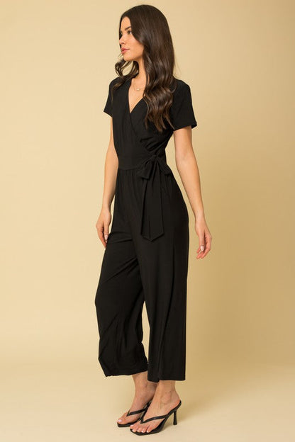 Solid Surplice Cropped Jumpsuit with Faux Wrap Black by Gilli | Fleurcouture