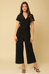 Solid Surplice Cropped Jumpsuit with Faux Wrap Black S by Gilli | Fleurcouture