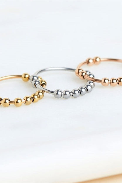 Stainless Steel Anxiety Spinning Bead Ring Size 5 Gold 1 by Dani &amp; Em | Fleurcouture