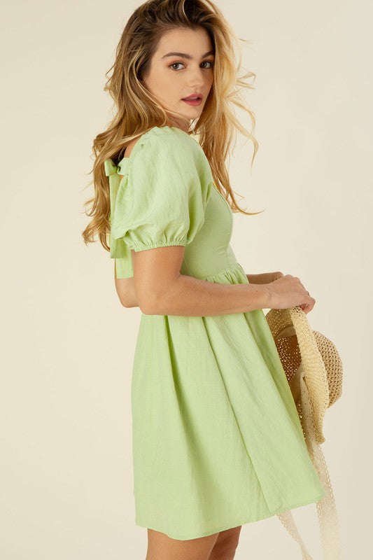 Tie back dress with puff sleeves Green by Lilou | Fleurcouture