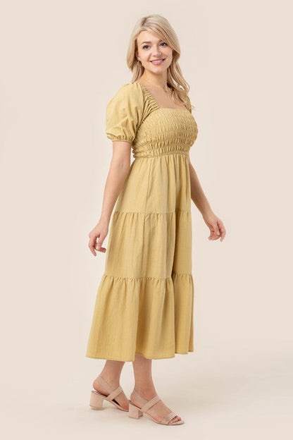 Tiered long dress with puff sleeves by Lilou | Fleurcouture