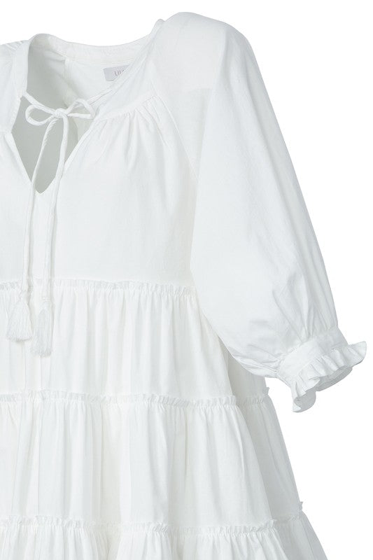 Tiered mini dress with tassel Off white by Lilou | Fleurcouture