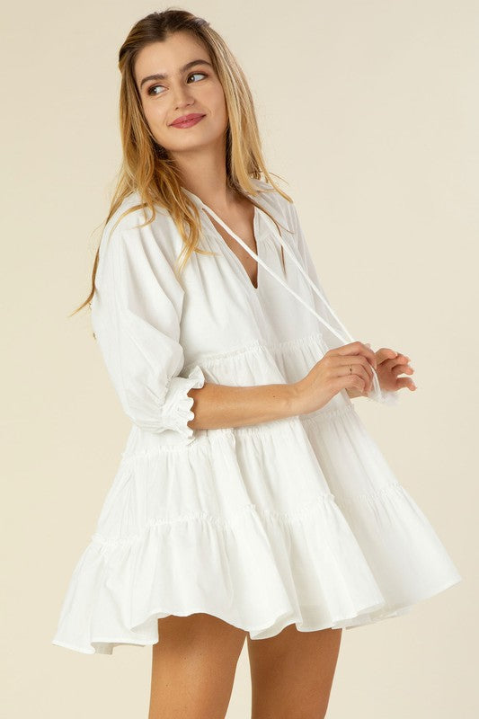 Tiered mini dress with tassel Off white M by Lilou | Fleurcouture