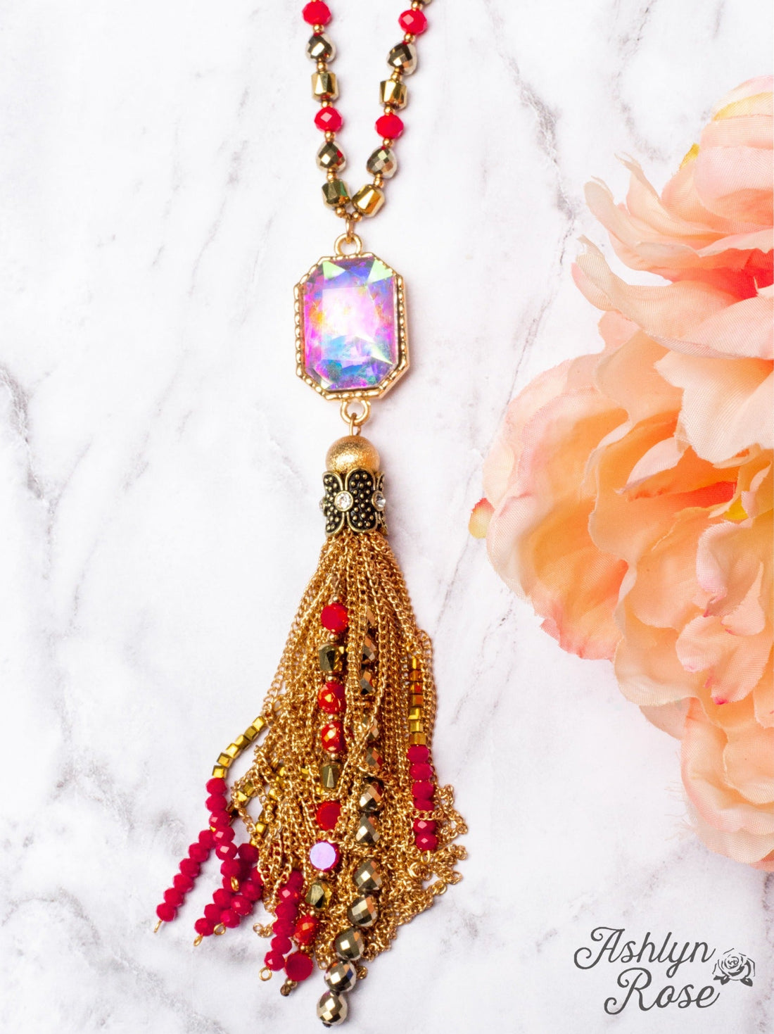 WATCH THE SUNSET WITH ME IRIDESCENT PENDANT WITH GOLD CHAIN TASSELS ON A MIXED CRYSTAL BEADED NECKLACE, RED Red One Size Necklace by Ashlyn Rose | Fleurcouture