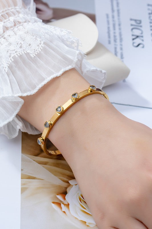 water proof stainless steel gem heart hinge bangle Gold one size by LA3accessories | Fleurcouture