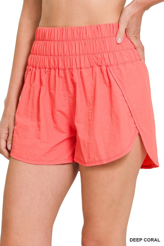 Windbreaker Smocked Waistband Running Shorts DEEP CORAL S by ZENANA | Fleurcouture