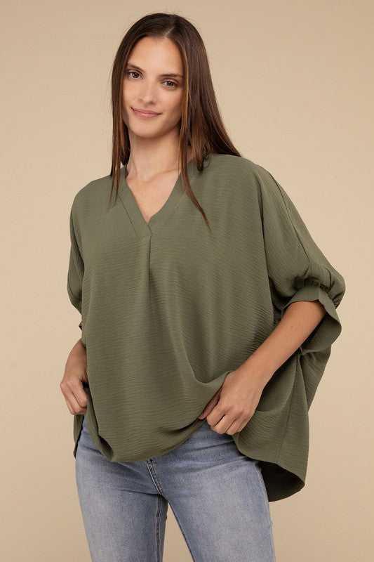 Woven Airflow V-Neck Puff Half Sleeve Top by ZENANA | Fleurcouture